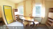 A room with a bunk bed
