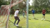 Students playing football on campus in Bad Schussenried