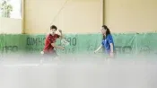 Students playing tennis in our indoor court in Bad Schussenried