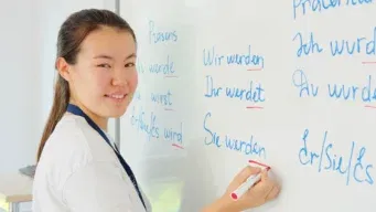Students at the whiteboard in Berlin