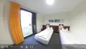 Uma vista panorâmica de 360° de um quarto duplo